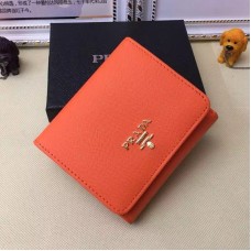 Portfele Prada 1M0176 ze skóry saffiano w kolorze pomarańczowym